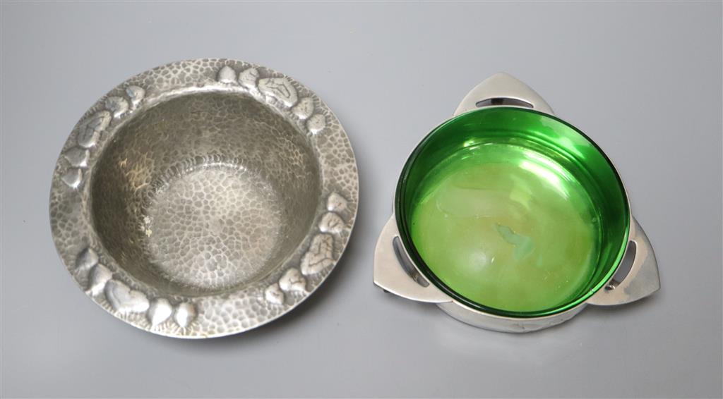 A Libertys Tudric pewter bowl and a butter dish, hammered design, shape no. 0187, 15.5cm diameter, the three handled bowl with green